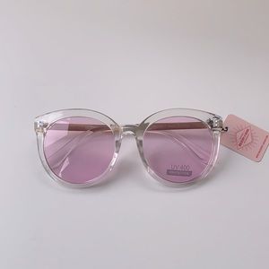 Clear rimmed sunglasses with pink tinted lenses!